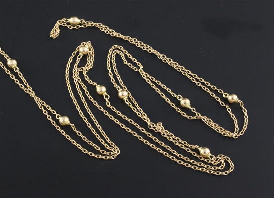 An Edwardian 15ct gold guard chain, 58in.